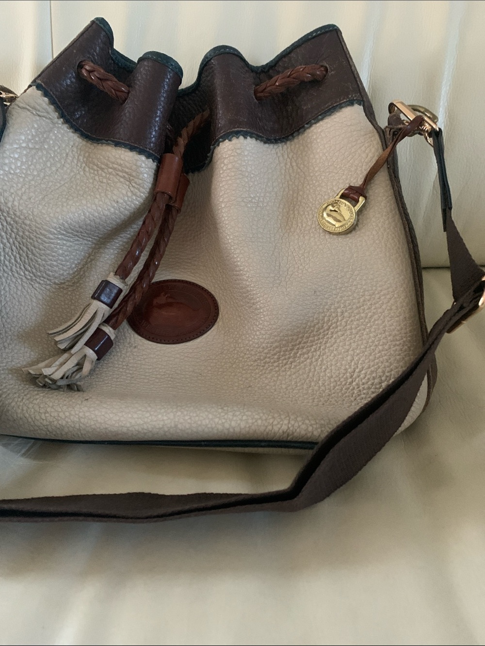 Dooney & Bourke Vintage Cream and Brown Leather Drawstring Shoulder Bag